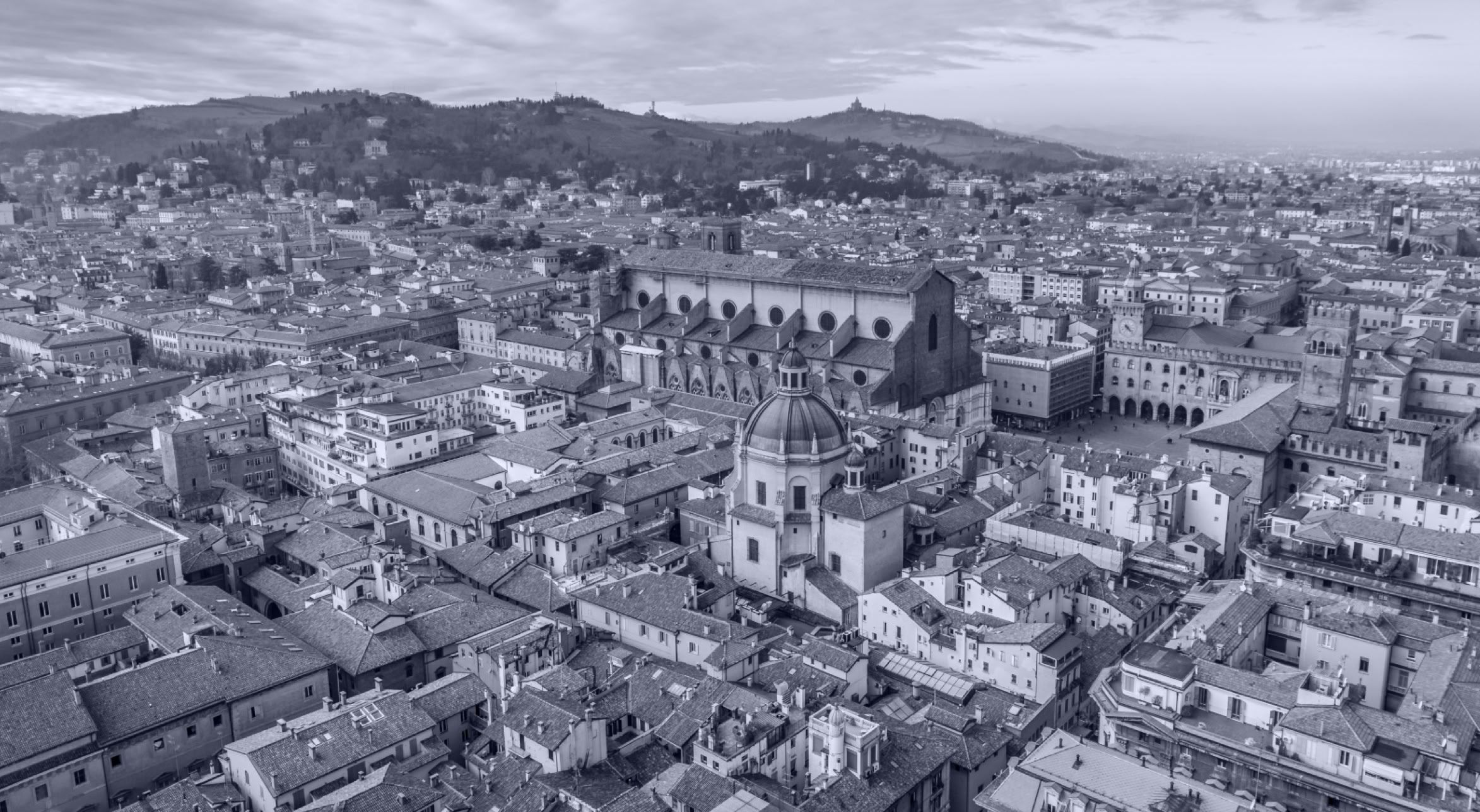 Man Taking Photo of Brown Decorative Speaker